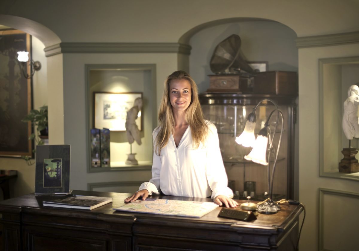 Hotel receptionist at the front desk