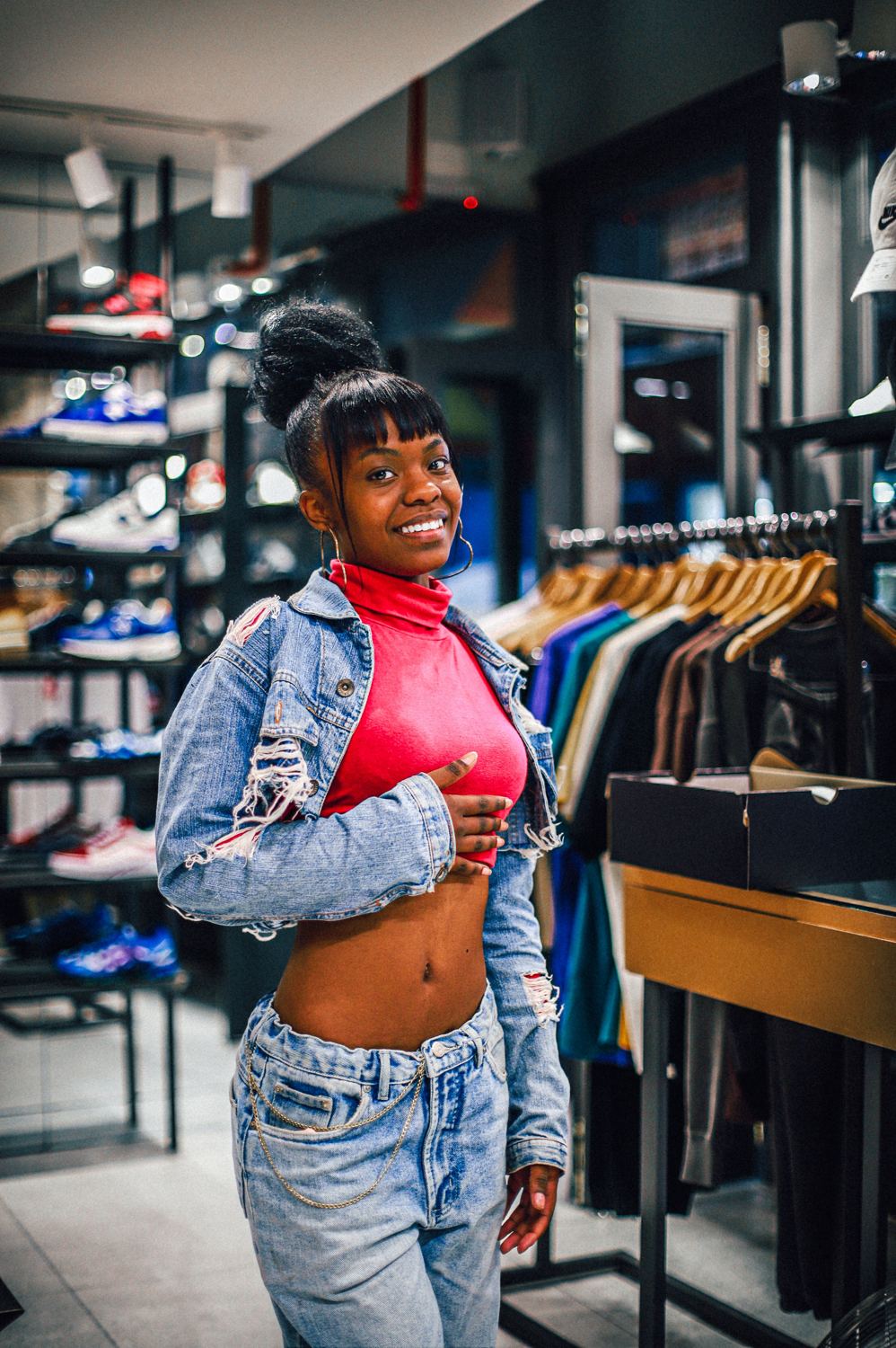 A woman smiling in a shop